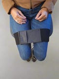 Wide elastic strap for keeping legs together for wheelchair users product logo