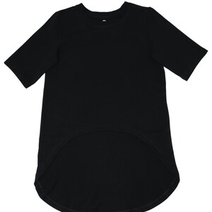 May include: Black t-shirt with short sleeves and a rounded, elongated hemline. The shirt has a crew neck and is made of a solid, opaque fabric. The design is simple and versatile, suitable for various casual outfits.