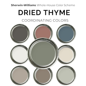 May include: Nine paint tins in a circular arrangement, showcasing a range of colours such as grey, pink, blue, white, and beige. The central tin is a muted green. The text "DRIED THYME" and "COORDINATING COLORS" are visible.