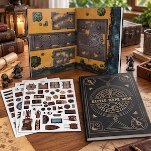 May include: A hardback book titled BATTLE MAPS BOOK with gold foil geometric designs on a black cover, displayed open to show a yellow grid map of a stone courtyard and ruins, accompanied by several sheets of small adhesive game piece stickers.