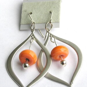 Coral orange glass lampwork beaded silver teardrop earrings with sterling silver ear wire