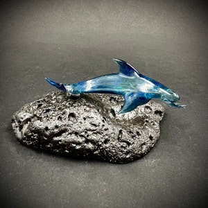 Blue sparkle dolphin glass sculpture