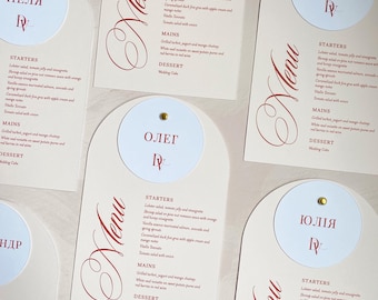 Arch wedding menu with personalized place card and gold brad
