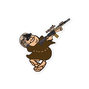 May include: A sticker featuring a cartoon illustration of a friar wearing a tactical helmet and holding a rifle. The friar is depicted in a dabbing pose, with the rifle angled upwards. The sticker has a white border.