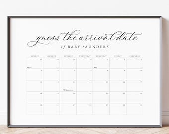May include: A framed white calendar with a black border. The text "guess the arrival date of BABY SAUNDERS" is at the top. The calendar grid is for April, with a heart symbol on the 20th.