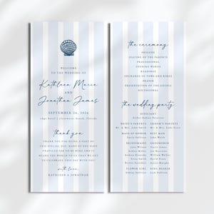May include: A wedding ceremony program with blue and white stripes. The program includes the names Kathleen Marie and Jonathan James, the date September 26, 2026, and the location Edge Hotel, Clearwater Beach, Florida. The program also includes the order of the ceremony and the wedding party.