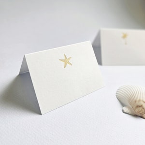 Wedding Escort Cards / Place Cards, Folded Gold or Silver Foil Tropical Destination Wedding Place Cards Starfish, Anchor, Palm Tree 画像 1