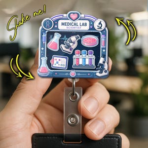 May include: A rectangular badge reel featuring a Medical Lab Scientist design with a dark blue background, a microscope, test tubes, a petri dish, and a clipboard. The text reads Medical Lab Scientist. The frame includes pink heart accents.