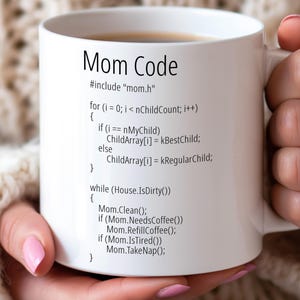 May include: White ceramic mug with a black and grey design. The mug features the text "Mom Code" and a code snippet that reads "#include "mom.h"" for (i = 0; i < nChildCount; i++) { if (i == nMyChild) ChildArray[i] = kBestChild; else ChildArray[i] = kRegularChild; } while (House.IsDirty()) { Mom.Clean(); if (Mom.NeedsCoffee()) Mom.RefillCoffee(); if (Mom.IsTired()) Mom.TakeNap(); }