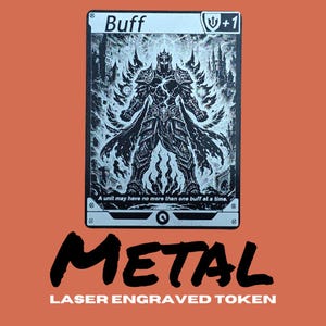 May include: A black and white laser-engraved metal token with the word "Buff" and a "+1" symbol. The token features an illustration of a warrior and the text "A unit may have no more than one buff at a time." The word "METAL" and "LASER ENGRAVED TOKEN" are also displayed.