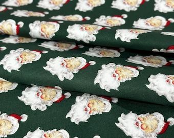 Classic Santa Faces – Quilting Cotton by the Yard – Green Christmas Fabric