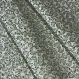 May include: A set of three ceramic mugs with a speckled, matte finish. The mugs are in shades of cream, light gray, and dark gray. Each mug has a simple, minimalist design, perfect for coffee or tea.