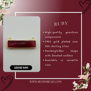 May include: A 10x40 mm ruby gemstone bar pendant with gold plated 925 sterling silver components. The pendant is rectangular with a faceted surface.