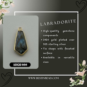May include: Gold plated labradorite gemstone pendant in a tie shape with a faceted surface. The pendant measures 10mm by 20mm.  The pendant is made of 925 sterling silver and is available in various sizes.
