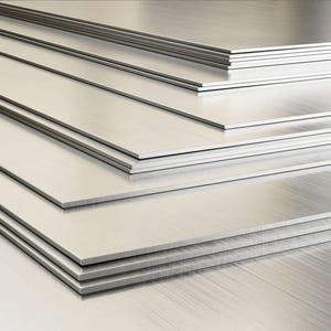 May include: A stack of several brushed metal sheets, each with a smooth, reflective surface. The sheets are rectangular and appear to be made of a silver-colored metal. The edges are clean and sharp, suggesting a precision manufacturing process.
