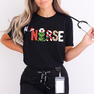 Camiseta de enfermera de Merry Grinchmas, divertida camiseta navideña de doctor Grinch, camiseta de enfermera Grinch, divertida camiseta navideña de enfermería, camiseta con estetoscopio de corazón
