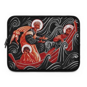 May include: Black laptop sleeve featuring a religious illustration. The artwork depicts figures in a boat amidst stylized waves, rendered in red, orange, and black. The design includes halos and a signature.