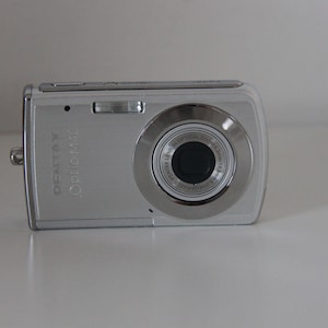 Pentax OPTIO S1 14.0MP 5x Digital Camera - Silver | eBay