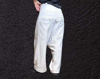 Beige Hose mit tiefem Schritt: Dekonstruierter Avantgarde Streetwear