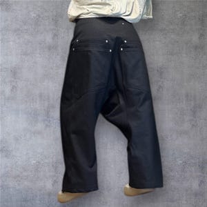 Deconstructed Black Denim Drop Crotch Pants: Avant-Garde Streetwear