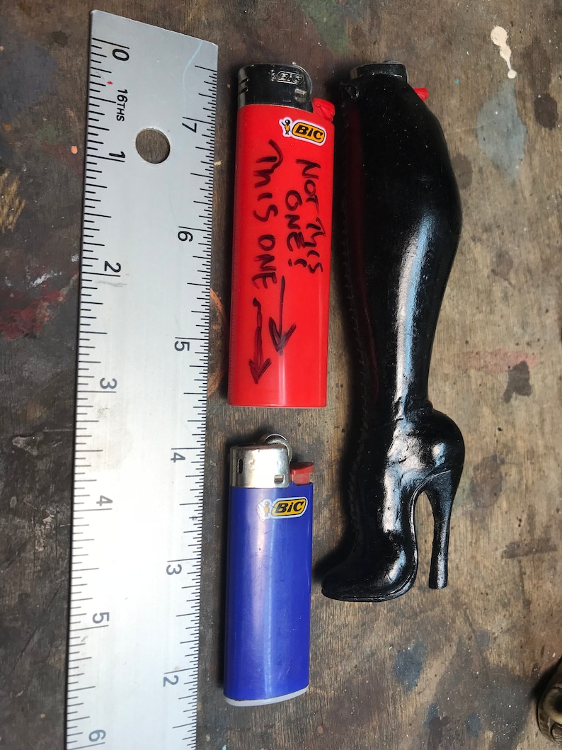 polish boots with lighter