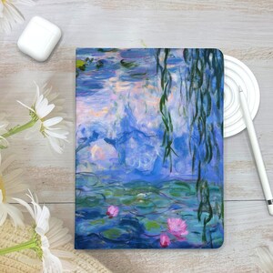 May include: A painting of water lilies in a pond with a weeping willow tree in the background. The water is a light blue color and the lilies are pink. The painting is done in a style reminiscent of Impressionism.