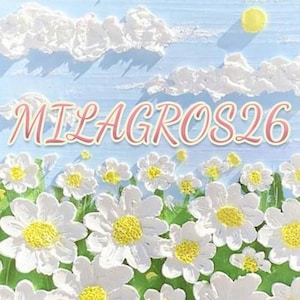 May include: A field of white daisies with a blue sky and white clouds in the background. The text "MILAGROS26" is written in pink letters across the top of the image.