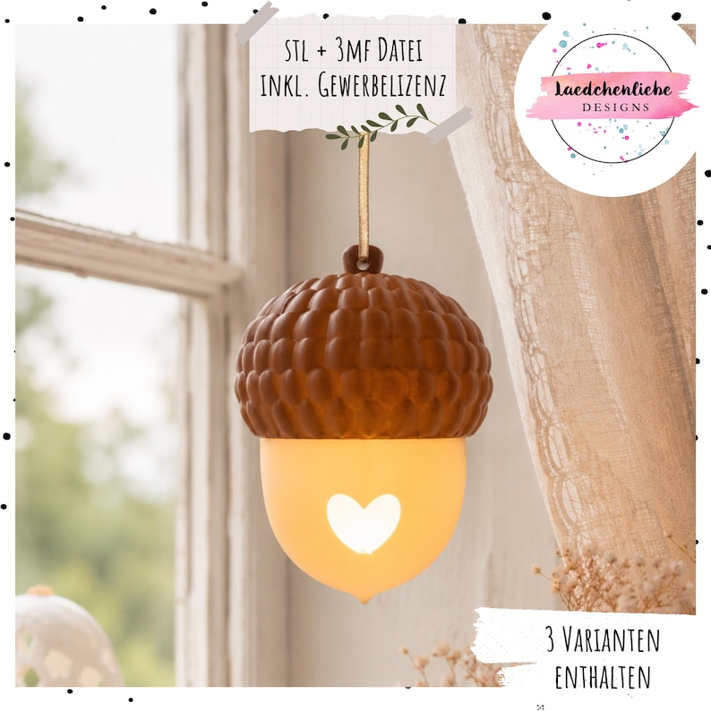 May include: A hanging acorn-shaped ornament featuring a textured brown cap and a smooth, glowing cream-colored base with a heart-shaped cutout. The ornament is suspended by a thin ribbon and includes text reading STL + 3MF DATEI INKL. GEWERBELIZENZ and 3 VARIANTEN ENTHALTEN.