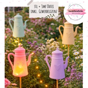May include: A collection of pastel-colored teapot-shaped garden lights. The teapots are in shades of pink, yellow, green, and purple, each with a heart-shaped cutout. The lights are placed in a garden setting with flowers and foliage. Text on the image reads "STL + 3MF DATEI INKL. GEWERBELIZENZ".