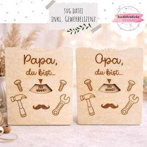 Könnte beinhalten: Ein Set aus drei Keramikbechern mit gesprenkelter, matter Oberfläche. Die Becher sind in den Farbtönen Creme, Hellgrau und Dunkelgrau gehalten. Jeder Becher hat ein schlichtes, minimalistisches Design und einen abgerundeten Henkel.