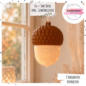 May include: A hanging acorn-shaped light fixture with a textured brown cap and a smooth, off-white base. The base features the embossed text "HERBST Licht" and small circular cutouts that allow light to shine through from the interior.