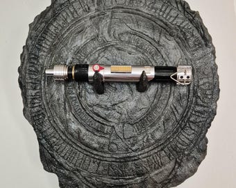 Fallen Order - Jedi - Piedra de exhibición de empuñadura de sable - Accesorio para colgar en la pared