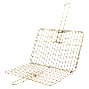 May include: A gold-coloured metal grill with a folding design and a handle. The grill is made of a wire mesh and is designed for cooking over an open flame.