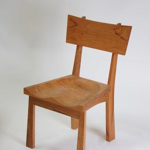 Enso Dining Chair, a solid wood dining chair with clean lines and gentle curves, handmade by TY Fine Furniture in Columbus, Ohio