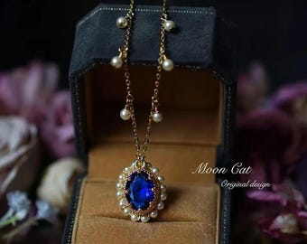 Colar vitoriano com pérolas e cristais de safira azul - banhado a ouro 18K