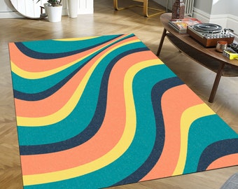 May include: Abstract rug with a wavy pattern in shades of teal, orange, yellow, and navy blue.