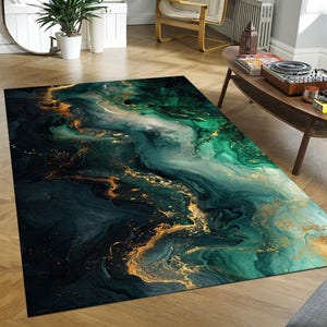 May include: A rectangular area rug with an abstract design. The rug features a dark teal and emerald green marbled pattern with gold accents. The design has a flowing, liquid appearance, suitable for a living room or bedroom.