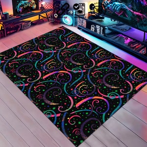 May include: A black area rug with a colorful swirl pattern. The swirls are in shades of pink, blue, green, and orange. The rug has a black background with small white dots.
