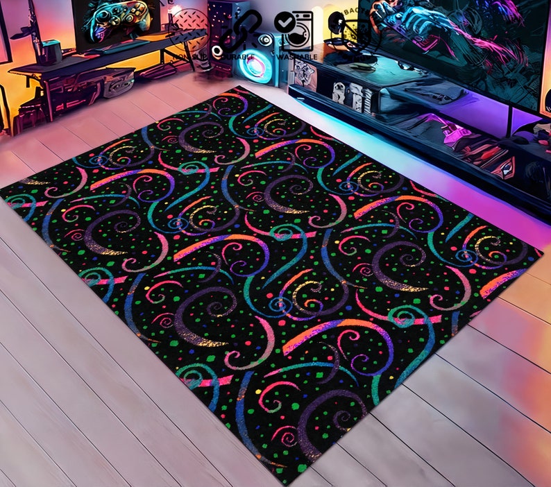 May include: A black area rug with a colorful swirl pattern. The swirls are in shades of pink, blue, green, and orange. The rug has a black background with small white dots.