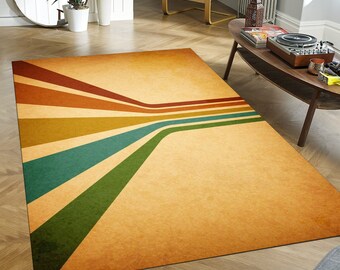 May include: A vintage-style rug with a faded, textured background and a design of colorful stripes converging in the center. The stripes are in shades of brown, orange, yellow, green, and blue.