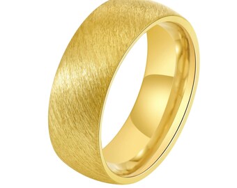 May include: A brushed gold wedding band with a rounded profile.
