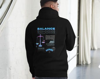 Moletom Balance com capuz e mensagem de significado sobre o Islã, a religião muçulmana e o Alcorão.