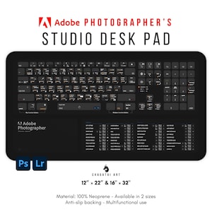 May include: Black Adobe Photographer's Studio Desk Pad with keyboard layout and function keys. The pad includes the text "Adobe Photographer's Studio Desk Pad", "Ps", and "Lr". Available in 12" x 22" and 16" x 32" sizes.