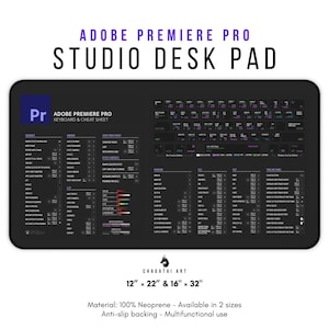 May include: Black studio desk pad for Adobe Premiere Pro, with keyboard shortcuts and a cheat sheet. The pad includes the text "Adobe Premiere Pro Studio Desk Pad" and is available in two sizes: 30.5cm x 56cm and 40.6cm x 81.3cm.