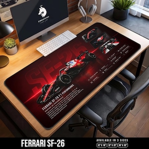Peut inclure: Un tapis de bureau rectangulaire orné d'un graphique de voiture de course Ferrari SF-26 Formula 1 rouge et noir. Le design inclut des spécifications techniques, des détails moteur et le texte Ferrari SF-26 F1 Performance sur fond rouge.