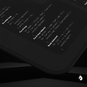 A developer-friendly JavaScript mouse pad with all essential JS commands and functions. The perfect coding desk mat for work, study, and gaming.