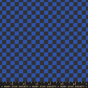 May include: A fabric with a checkered pattern in shades of blue and black. The squares are evenly sized and arranged in a grid. The fabric has a ruler along the bottom edge with the text "RUBY STAR SOCIETY".