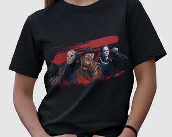 May include: Black t-shirt with a graphic of three horror movie characters: Jason Voorhees, Freddy Krueger, and Michael Myers. The graphic is in a red and black color scheme.