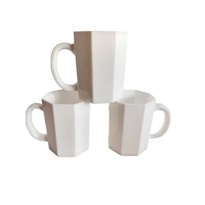 May include: Three white ceramic mugs stacked in a triangular arrangement. Each mug has a geometric, faceted design and a curved handle. The mugs are all the same size and shape, with a clean, modern aesthetic.