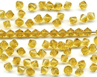 Vintage Golden Topaz Beads 5mm Glass Bicones Spacers 72 Pcs.